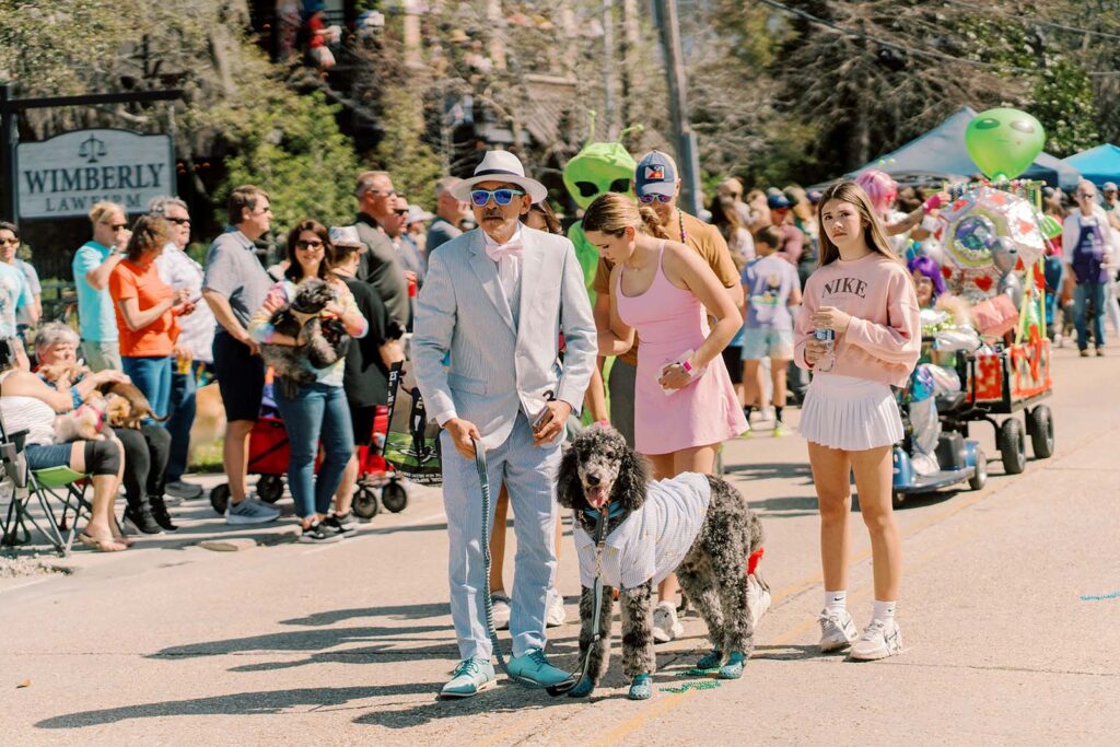 Puppy and people in a parade