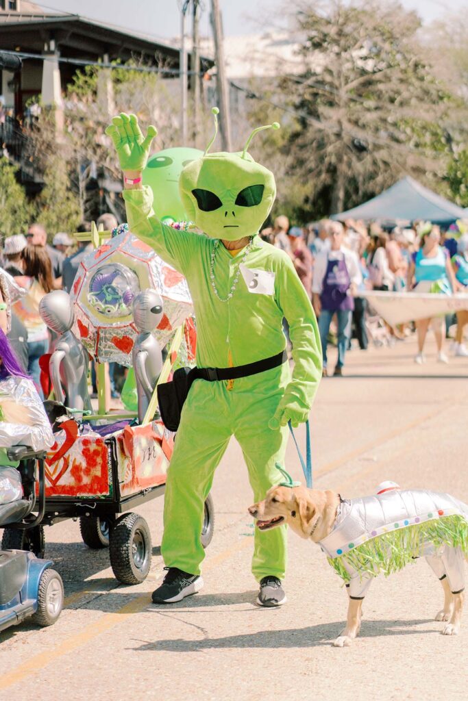 pup and owner in green alien costume