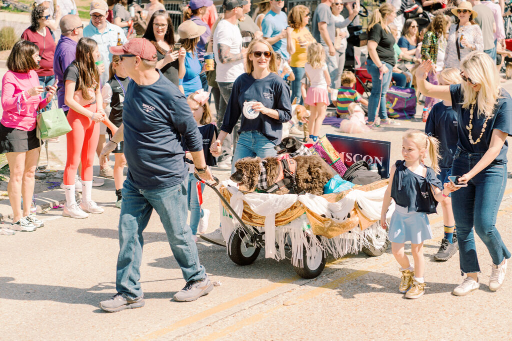 pups being pulled in a float