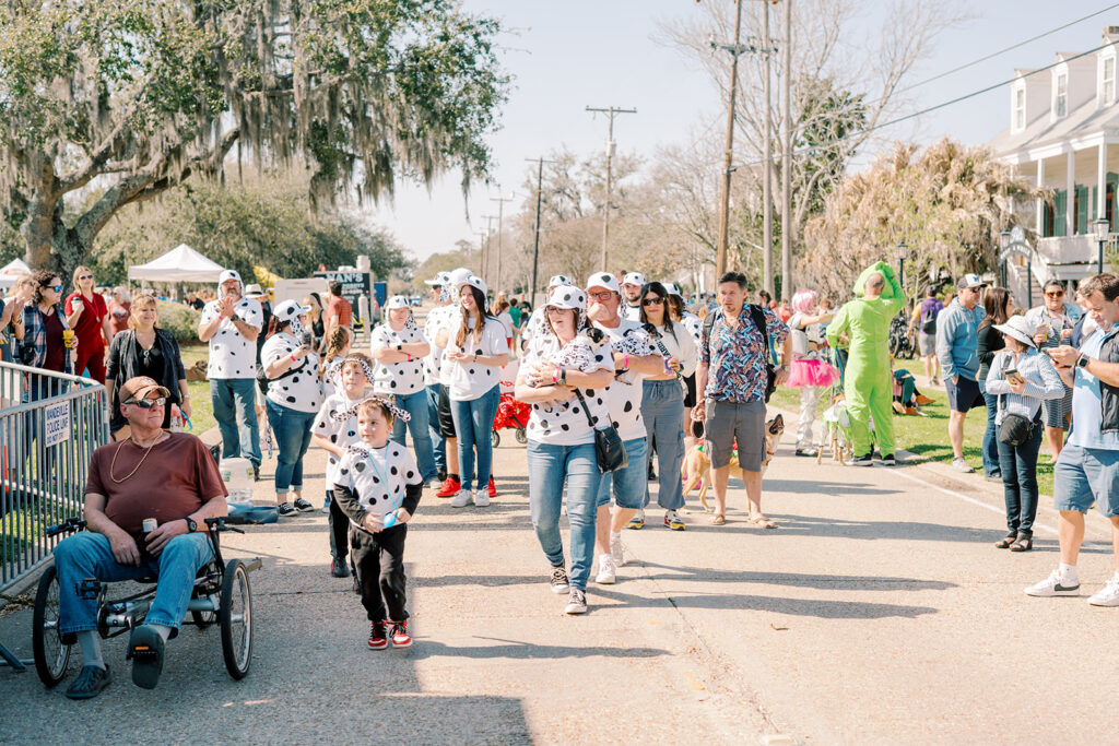 parade-goers in dalmatian costumes